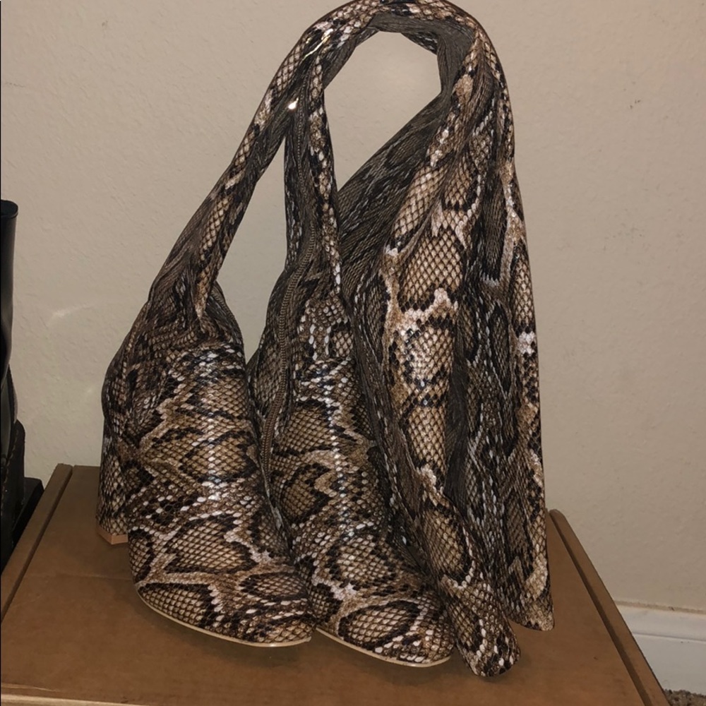 Snakeskin thigh high boots